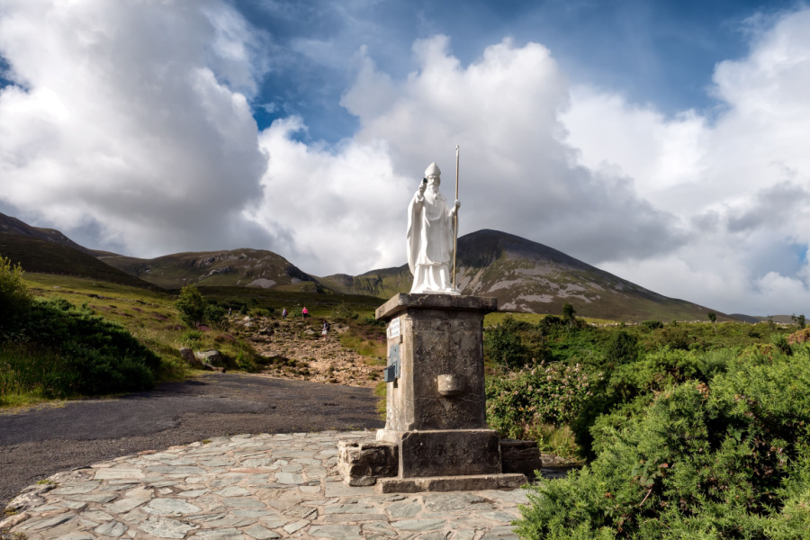 Irish Expressions: Ireland Sightseeing.  The statue at the base of Croagh Patrick per license with Shutterstock.