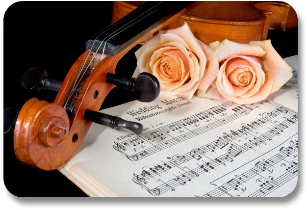 Irish Expressions - Irish Wedding Songs.  Image of violin with sheet music.