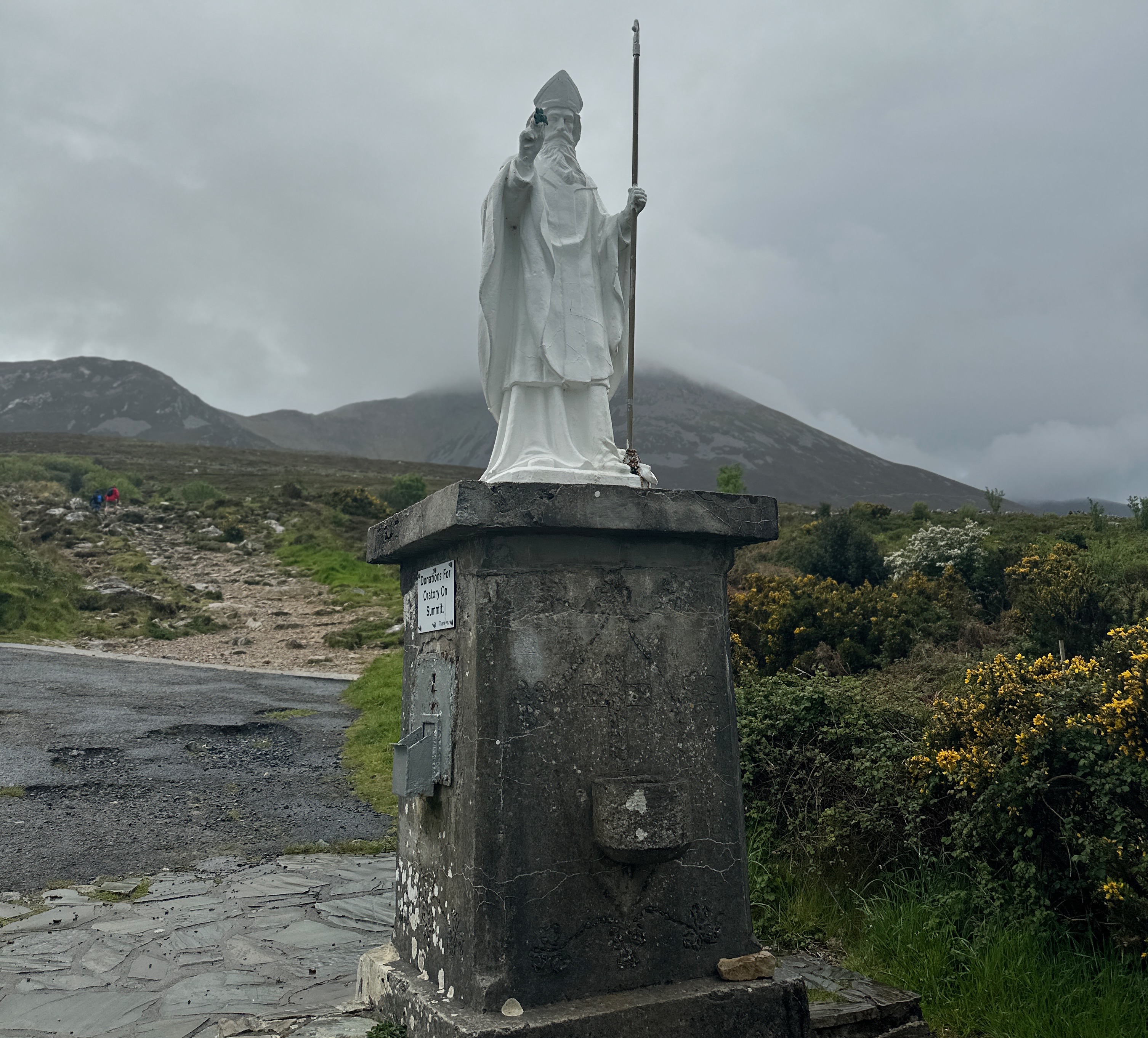 Irish Expressions:  Hiking Croagh Patrick.  Statue of St Patrick at the start of the trail.