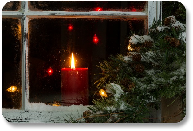 Irish Expressions:  Irish Christmas Blessings.  Holiday candle in the window by license with Shutterstock.com.