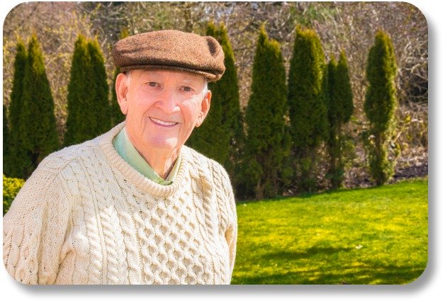 Irish Wool Sweaters - Smiling Man in Sweater and Cap