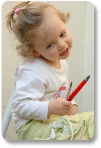 Irish baby girl names.  Adorable little girl with pencils.
