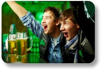 Irish Expressions:  Irish slang words and phrases.  Image of two young men celebrating in a bar.