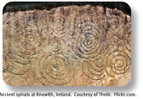 Irish Expressions: Celtic Symbols.  Image of single spirals at Knowth, courtesy of Flickr.com.